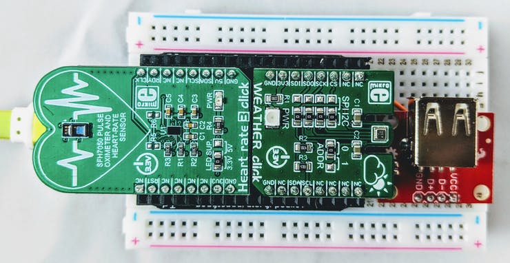 PocketBeagle® with click boards and USB host port