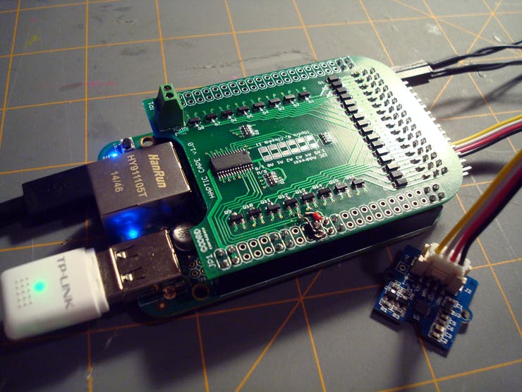 Here it is! The finished Haptic Cape plugged into a BeagleBone Green with a Seeed Grove Compass sensor. Don't worry about those little wires in the bottom middle, those were placed to overcome a trace routing error that has already been fixed in the bitbucket repository. Read on to learn more...