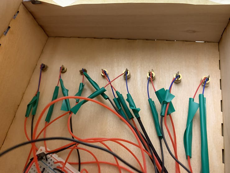 Figure 5. Laser Diodes Placed into Holes of Top Box 