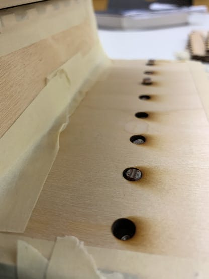 Figure 6. Photoresistors Placed into Holes of Bottom Step Box 