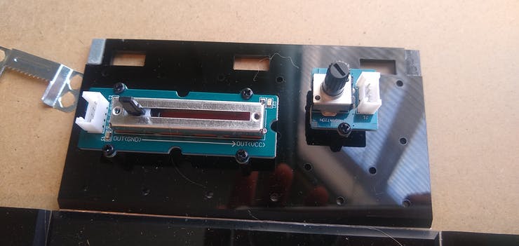 a slide potentiometer and rotary encoder