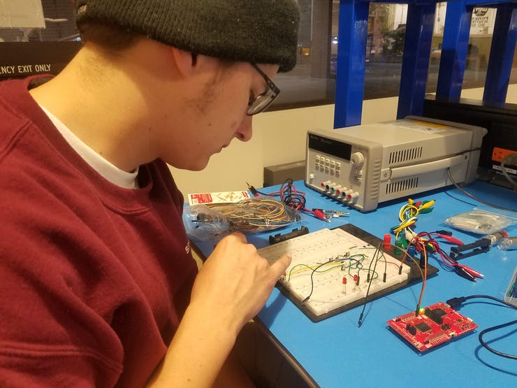 Working on a bench at the Makerspace